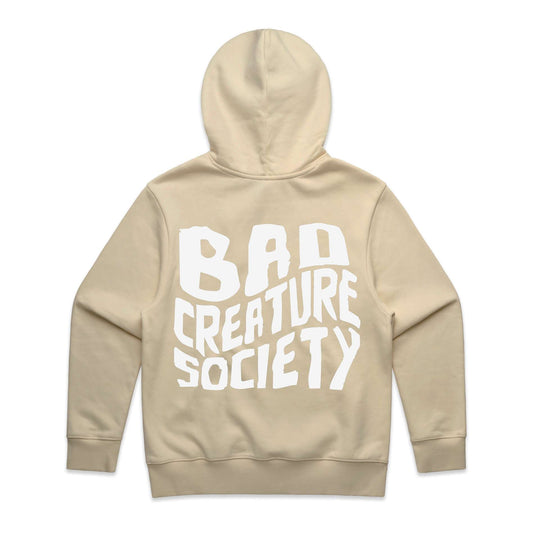 Beige hoodie with 'Bad Creature Society' text on the back against a white background